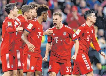  ?? FOTO: IMAGO ?? Gruß Nummer 3 – Joshua Kimmich (2. v. re.) und Kollegen bejubeln Kingsley Comans (4. v. li.) Tor.