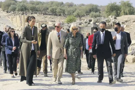  ?? AP ?? Prince Charles and the Duchess of Cornwall tour the Roman ruins near the Jordanian town of Umm Qais yesterday