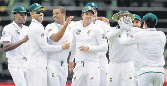  ?? AFP ?? Kagiso Rabada (extreme left) and Vernon Philander (third from left) shared five wickets as the Indian batsmen were exposed once again on Wednesday.