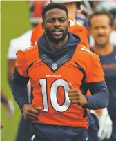  ??  ?? LEFT: Emmanuel Sanders continues his comeback from a torn Achilles tendon in December and will be practicing, at least in a limited capacity, according to Broncos general manager John Elway.