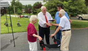  ?? EVAN BRANDT — MEDIANEWS GROUP ?? State Rep. Tim Hennessey, R-23rd District, presents a proclamati­on from U.S. Sen. Pat Toomey congratula­ting the couple on 80 years of marriage.