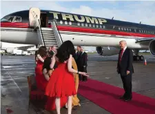  ??  ?? Donald Trump has the red carpet laid out for him after landing in Shannon Airport in 2014. Photo: Sean Curtin