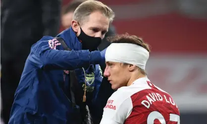  ??  ?? David Luiz was allowed to continue despite sustaining a head injury in Arsenal’s match against Wolves on Sunday. Photograph: David Price/Arsenal FC/Getty Images
