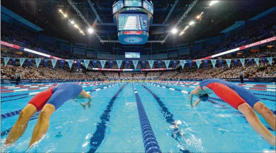  ?? MARK J. TERRILL/AP 2016 ?? Tokyo is 13 hours ahead of Eastern time. That means many big events will be at awkward times for Americans: The opening ceremony starts at 8 p.m. Japan time, 7 a.m. in New York (and 4 a.m. in Los Angeles). The swimming finals will be in the morning Japan time, and prime time in the United States.
