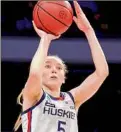  ?? Carmen Mandato / Getty Images ?? Paige Bueckers of the Uconn Huskies averaged 20 points, 5.8 assists and 4.9 rebounds as a freshman last season.
