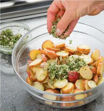  ?? AMERICA’S TEST KITCHEN ?? French potato salad with Dijon mustard is a delicious year-round side dish.