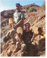  ?? CHRISTOPHE­R HARDY ?? Long-time friends , fellow rockhounds, and co-claim owners of Creamsicle, Jole Merrill (standing) and Paul Fabela, display samples of selenite examples from the claim.