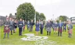  ??  ?? Gesture Games directors and the Lord Lieutenant Stephen Leckie marked the 150th aniversary of Criff Highland Gathering in Market Park on what would have been Games Day last year