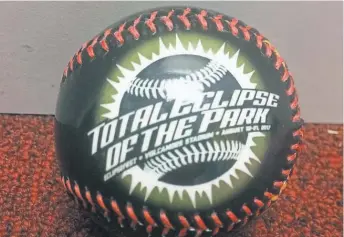  ?? FLETCHER LIKE, SALEM- KEIZER VOLCANOES ?? This souvenir baseball will be on sale atMonday’s Salem- Keizer ( Ore.) Volcanoes’ Eclipse Game.