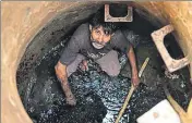  ?? AFP FILE ?? Eradicatio­n of manual scavenging is part of the BJP government’s Swachh Bharat Abhiyan.