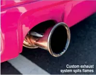  ??  ?? Custom exhaust system spits flames