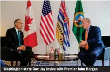 ??  ?? Washington state Gov. Jay Inslee with Premier John Horgan