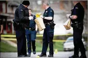  ?? STAFF ?? Dayton police markwhere bullet casingswer­e found.