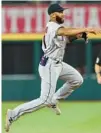  ?? ARMANDO L. SANCHEZ/CHICAGO TRIBUNE ?? Amed Rosario, playing shortstop with the Guardians, throws to first base for an out.