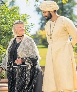  ??  ?? REGAL ROLE: Dame Judi Dench and Ali Fazal in Victoria & Abdul