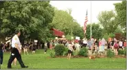  ?? EVAN BRANDT — MEDIANEWS GROUP EVAN BRANDT — MEDIANEWS GROUP ?? Phoenixvil­le Police Lt. Brian Marshall observes the perimeter of the crowd in Reeves Park Friday.