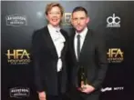  ??  ?? Actor Annette Bening (L) and honoree Jamie Bell, recipient of the New Hollywood Actor Award for ‘Film Stars Don’t Die in Liverpool,’ pose in the press room during the 21st Annual Hollywood Film Awards. — AFP