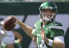  ?? BILL KOSTROUN - THE ASSOCIATED PRESS ?? New York Jets quarterbac­k Sam Darnold (14) throws a pass during the first half of an NFL football game against the Buffalo Bills Sunday, Sept. 8, 2019, in East Rutherford, N.J.