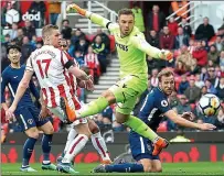  ??  ?? It’s a hit:
Harry Kane was awarded this goal at Stoke — but only following an appeal