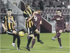  ??  ?? 0 Jamie Walker scores Hearts’ third goal against East Fife.