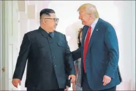  ?? AFP FILE ?? New BFFS? Kim Jong Un and Donald Trump share a laugh during their summit in Singapore.