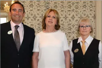  ??  ?? Former President Mary McAleese pictured with City Hotel Hotel staff including manager Shane Hand during a recent visit to the local hotel.