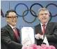  ??  ?? Thomas Bach, right, and Akio Toyoda.