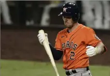  ?? Associated Press ?? Houston’s Alex Bregman reacts after striking out with the bases loaded in the eighth inning of Game 7.