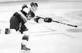  ?? STEPHEN M. DOWELL/ORLANDO SENTINEL ?? The Solar Bears’ Colby McAuley shoots during the team’s game against the South Carolina Stingrays on Tuesday night at Amway Center.