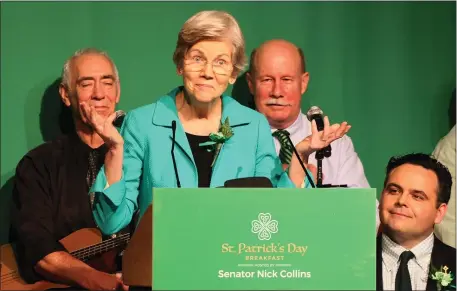  ?? NANCY LANE — BOSTON HERALD ?? Sen. Elizabeth Warren cracks jokes during the St. Patrick’s Day Breakfast on Sunday.