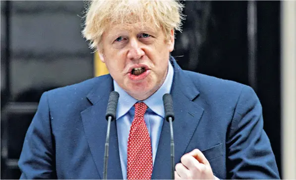  ??  ?? Boris Johnson makes a surprise address outside No 10 Downing Street, where he said the country was ‘making progress’ against the virus and praised the public’s ‘grit and guts’