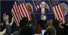  ?? CHIP SOMODEVILL­A — GETTY IMAGES ?? Federal Reserve Bank Chair Jerome Powell takes questions from reporters about the economy Wednesday. Powell said that three interest rate cuts are possible this year.