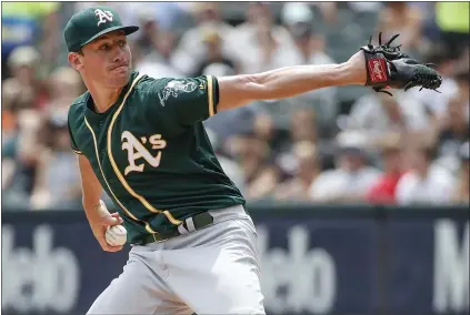  ?? KAMIL KRZACZYNSK­I — THE ASSOCIATED PRESS ?? Athletics starting pitcher Chris Bassitt struck out seven White Sox batters and extended his scoreless innings streak against the Sox to 13.