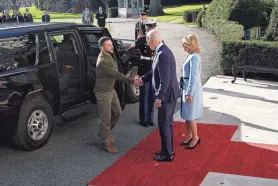  ?? PATRICK SEMANSKY/AP ?? President Joe Biden and first lady Jill Biden welcome Ukrainian President Volodymyr Zelenskyy to the White House Wednesday. The 10-hour visit realized White House hopes to host Zelenskyy by year’s end.