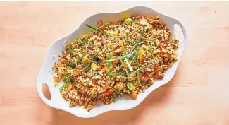  ?? STACY ZARIN GOLDBERG/THE WASHINGTON POST ?? Quick Quinoa Pilaf is ready in less than 30 minutes. Whole grains keep you fuller longer, help keep your blood sugar steady, and have more antioxidan­ts and other nutrients than refined grains.