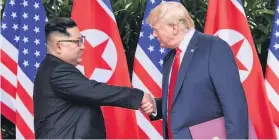  ??  ?? > North Korea leader Kim Jong Un and US President Donald Trump