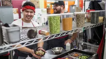  ?? MARCUS OLENIUK/TORONTO STAR ?? Brothers Shayne and Salar Madadi have carved out a niche for poke in Hamilton.