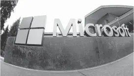  ?? TED S. WARREN/ASSOCIATED PRESS ?? Microsoft’s revenue from business software and Internet-based services, known as cloud computing, didn’t grow as much as analysts expected.