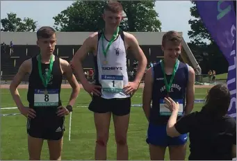  ??  ?? Tadgh Donnelly, running in the colours of St Joseph’s CBS, tops the podium after winning the Leinster Schools 3,000m championsh­ip in a fast 9:06.