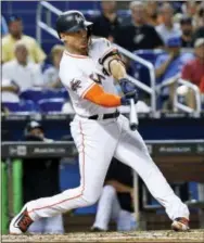  ?? WILFREDO LEE — THE ASSOCIATED PRESS ?? The New York Yankees made a huge splash in the offseason market by coming to an agreement to acquire superstar slugger Giancarlo Stanton from the Florida Marlins on Saturday.