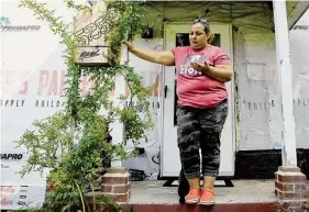  ?? Elizabeth Conley/Staff photograph­er ?? The wrap around Graciela Alvarez’s home in Port Arthur gives away that she’s still finishing repairs. For lack of funds, her family opted to fix it themselves.