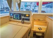  ??  ?? The Lagoon 42 (left) is a product of Groupe Beneteau, one of the world’s most prolific builders of cruising sailboats. The owners suite is an open, spacious cabin (above left), while the nav station boasts commanding views of the surroundin­gs (above right).