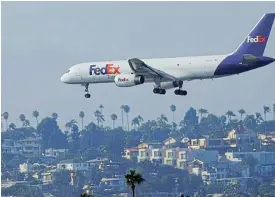  ?? /Reuters ?? Billions at stake: The US Postal Service is the biggest customer of overnight delivery company FedEx, and losing that business would slash nearly $2bn off the company’s annual turnover.