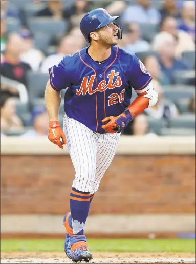  ?? Elsa / Getty Images ?? Pete Alonso of the Mets watches his solo home run in the first inning against the Nationals Monday night at Citi Field in New York.