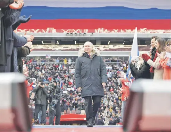  ??  ?? ►
El Presidente Vladimir Putin, durante un acto de campaña en Moscú, el pasado 3 de marzo.