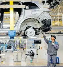  ?? STR/AFP ?? Mejora el dinamismo de la manufactur­a china