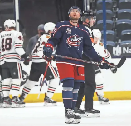  ?? ADAM CAIRNS/COLUMBUS DISPATCH ?? Blue Jackets left wing Stefan Matteau watches the replay of a goal by Blackhawks center Carl Soderberg during the first period Saturday at Nationwide Arena in Columbus.