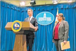  ?? Adam Beam The Associated Press ?? California Gov. Gavin Newsom announces the appointmen­t of Ana Matosantos, right, as California’s “energy czar” on Friday in Sacramento, California.