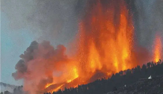  ?? AFP ?? Mount Cumbre Vieja erupts in the Canary Islands for the first time in 50 years, forcing thousands of residents to evacuate. Picture: