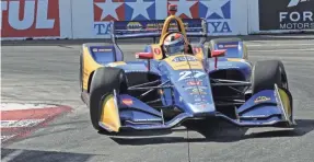  ?? RICHARD DOWDY VIA VERIZON INDYCAR SERIES ?? Alexander Rossi drives his No. 27 Honda to victory in the Toyota Grand Prix of Long Beach on Sunday.